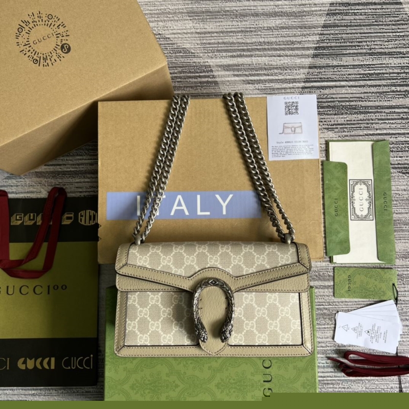 G*u*i top handle bags